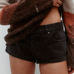 Nagnata Low Rise Micro Denim Short Washed Black on model