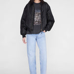 Anine Bing Cade Tee Leo Muse Washed Black styled with a leather jacket