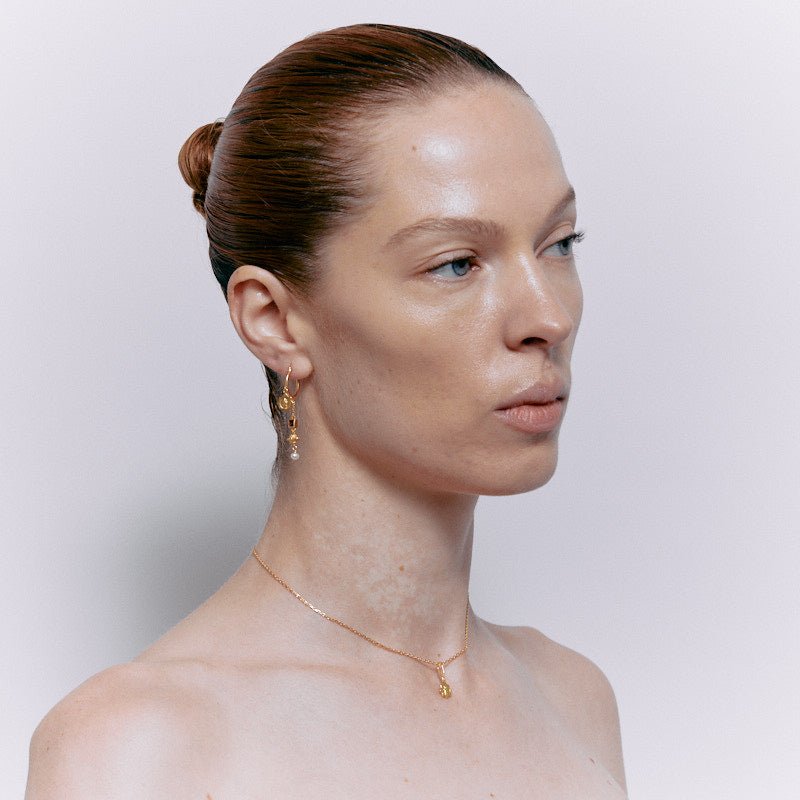 Cleopatra's Bling Jeanne Earrings with Garnet 18K Gold Plated on model