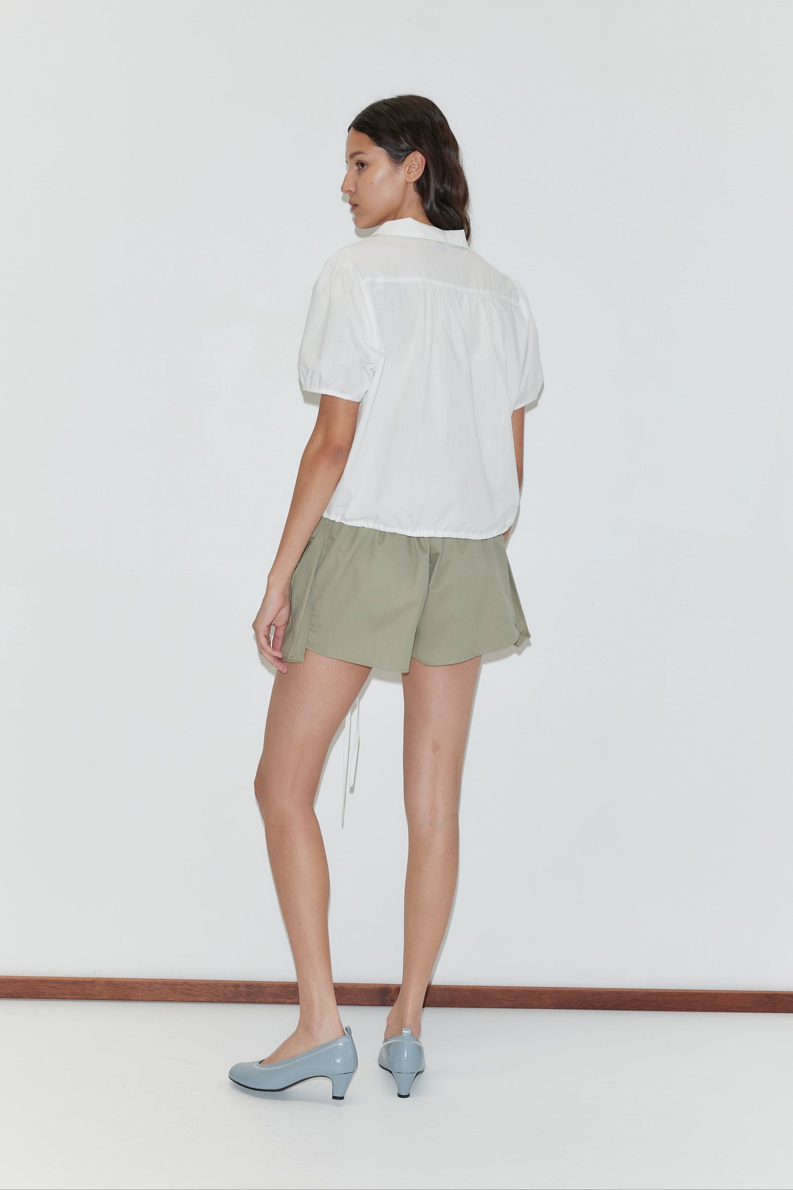 Deiji Studios Micro Pocket Short in Stone Green – back view | Peggy Concept Store