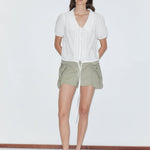 Deiji Studios Micro Pocket Short in Stone Green – front view, drawstring waist detail | Peggy Concept Store