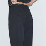Deiji Studios Snap Tab Pant in Black – detail view of snap tab waistband | Peggy Concept Store