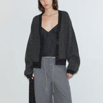 Deiji Studios Split Cardigan in Black Contrast – detail view of detachable lapel scarf | Peggy Concept Store