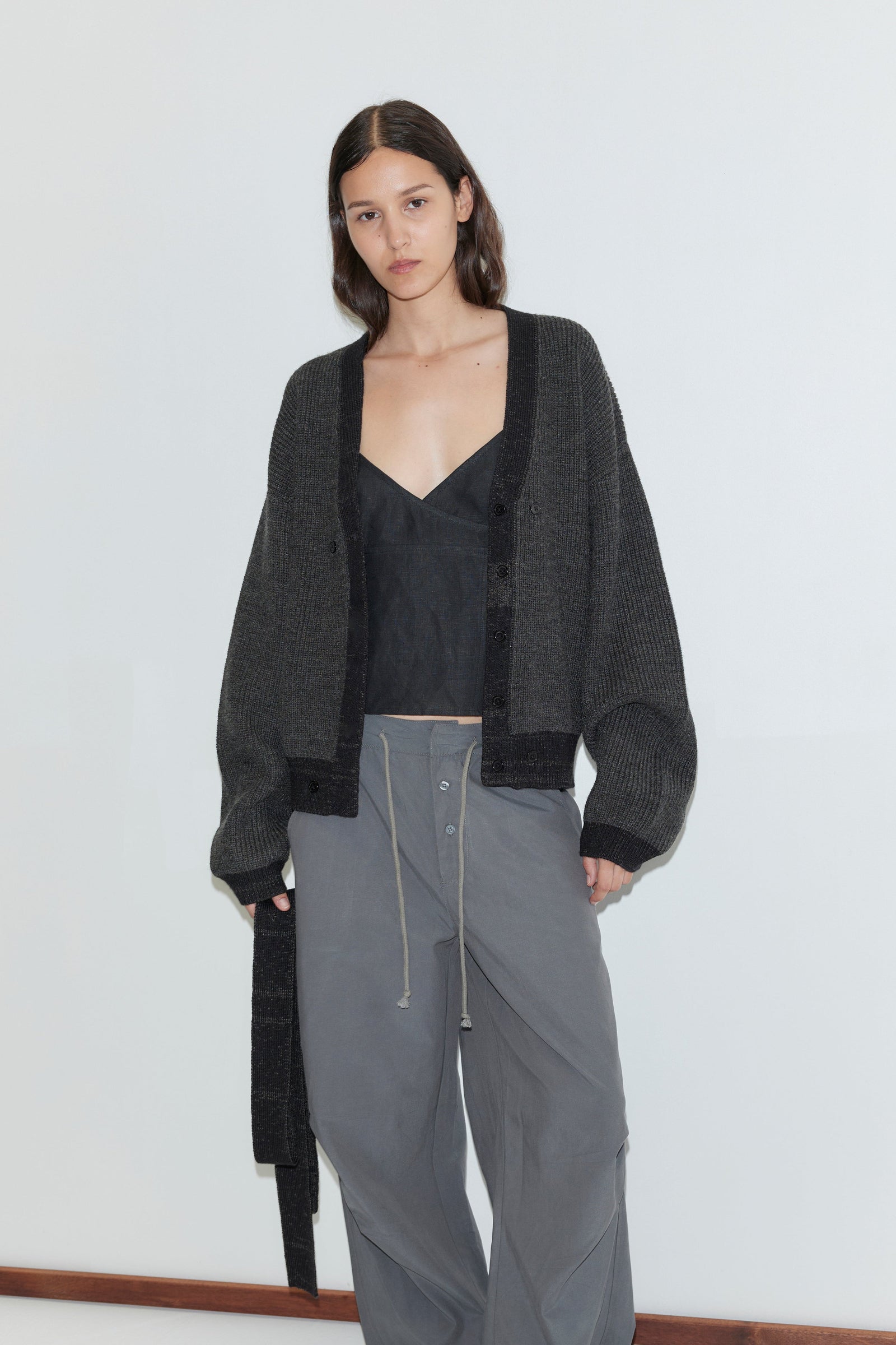Deiji Studios Split Cardigan in Black Contrast – detail view of detachable lapel scarf | Peggy Concept Store