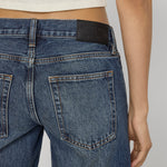 Frame The Gray jean in Tolerate on model detail
