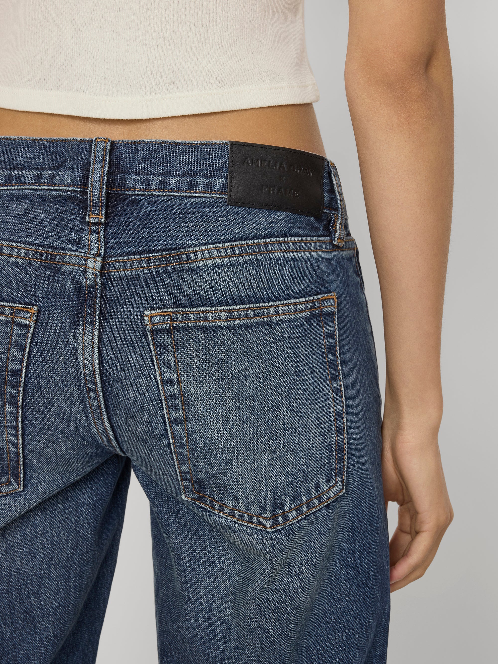 Frame The Gray jean in Tolerate on model detail