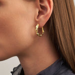 Hermina Athens Full Moon Hoops on model
