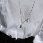Hermina Athens Sun Mini Clip On Lost Sea Diamond Cut Necklace on model
