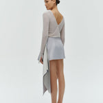 Women’s reversible top in silver styled for evening