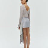 Women’s reversible top in silver styled for evening