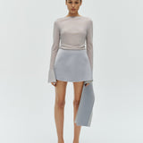 Silver reversible top styled with tailored skirt